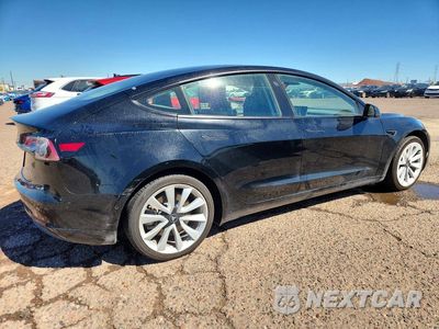 Trzecie zdjęcie samochodu z tyłu: 2022 TESLA MODEL 3 VIN:5YJ3E1EB4NF288970 - miniatura