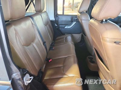 Zdjęcie 11 z 13 samochodu: 2013 JEEP WRANGLER UNLIMITED SAHARA VIN:1C4HJWEG6DL627217 - miniatura