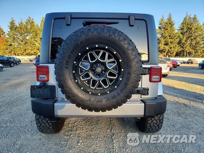 Zdjęcie 6 z 13 samochodu: 2018 JEEP WRANGLER UNLIMITED SAHARA VIN:1C4HJWEG7JL872961 - miniatura
