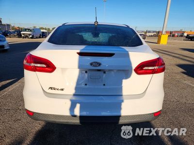 Zdjęcie 6 z 12 samochodu: 2017 FORD FOCUS SE VIN:1FADP3FE9HL315297 - miniatura