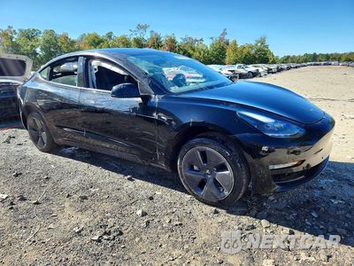 Czwarte zdjęcie samochodu z boku: 2022 TESLA MODEL 3 VIN:5YJ3E1EA4NF368485 - miniatura