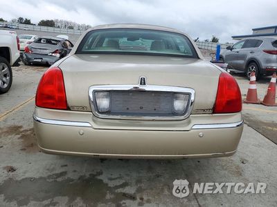 Zdjęcie 6 z 12 samochodu: 2004 LINCOLN TOWN CAR EXECUTIVE VIN:1LNHM81W54Y650714 - miniatura