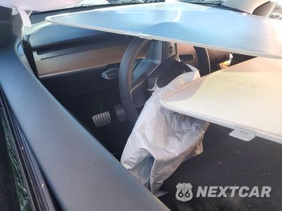 Zdjęcie 8 z 12 samochodu: 2023 TESLA MODEL Y VIN:7SAYGDEF2PF764997 - miniatura