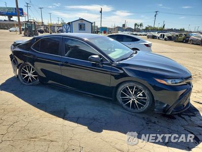Czwarte zdjęcie samochodu z boku: 2024 TOYOTA CAMRY HYBRID SE VIN:4T1G31AK1RU064772 - miniatura