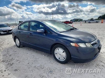 Czwarte zdjęcie samochodu z boku: 2006 HONDA CIVIC HYBRID VIN:JHMFA36296S012869 - miniatura