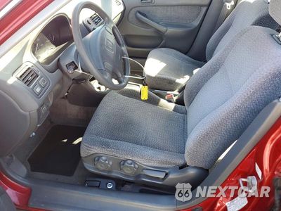 Zdjęcie 7 z 12 samochodu: 1999 HONDA CIVIC LX VIN:1HGEJ6674XL049335 - miniatura
