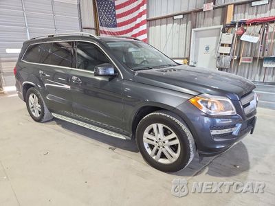 Czwarte zdjęcie samochodu z boku: 2016 MERCEDES-BENZ GL 450 4MATIC VIN:4JGDF6EE8GA697795 - miniatura