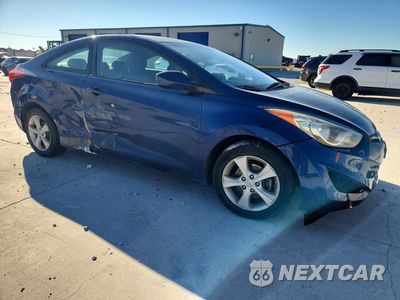 Czwarte zdjęcie samochodu z boku: 2013 HYUNDAI ELANTRA COUPE GS VIN:KMHDH6AE8DU005349 - miniatura
