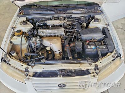 Zdjęcie 11 z 12 samochodu: 1999 TOYOTA CAMRY CE VIN:4T1BG22KXXU868455 - miniatura
