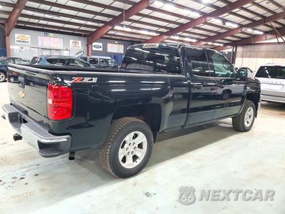 Trzecie zdjęcie samochodu z tyłu: 2015 CHEVROLET SILVERADO K1500 LT VIN:1GCVKRECXFZ344916 - miniatura