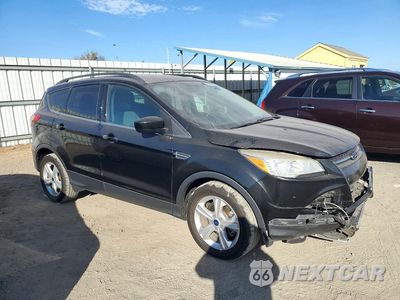 Czwarte zdjęcie samochodu z boku: 2015 FORD ESCAPE SE VIN:1FMCU0G95FUC89461 - miniatura