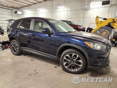 Czwarte zdjęcie samochodu z boku: 2016 MAZDA CX-5 GT VIN:JM3KE4DY7G0721323 - miniatura