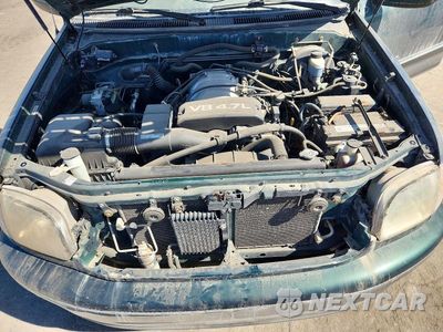 Zdjęcie 11 z 12 samochodu: 2000 TOYOTA TUNDRA ACCESS CAB LIMITED VIN:5TBBT4813YS087916 - miniatura