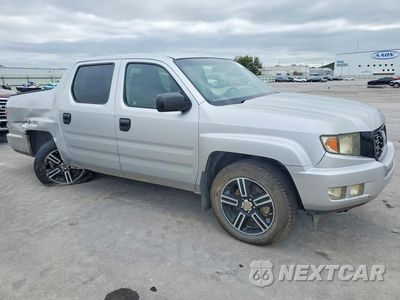 Czwarte zdjęcie samochodu z boku: 2012 HONDA RIDGELINE SPORT VIN:5FPYK1F78CB451889 - miniatura