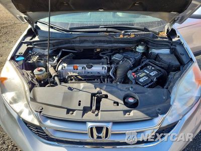 Zdjęcie 12 z 14 samochodu: 2010 HONDA CR-V EXL VIN:JHLRE4H71AC004613 - miniatura