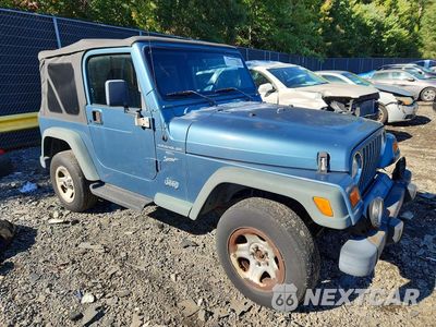 Czwarte zdjęcie samochodu z boku: 1999 JEEP WRANGLER / TJ SPORT VIN:1J4FY19S4XP418618 - miniatura