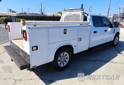Czwarte zdjęcie samochodu z boku: 2022 FORD F250 SUPER DUTY VIN:1FT7W2A68NEF64677 - miniatura