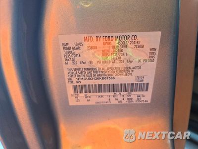 Zdjęcie 13 z 13 samochodu: 2006 FORD ESCAPE XLT VIN:1FMCU03126KB67586 - miniatura