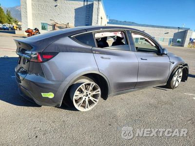 Trzecie zdjęcie samochodu z tyłu: 2022 TESLA MODEL Y VIN:7SAYGDEEXNF551929 - miniatura