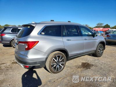 Trzecie zdjęcie samochodu z tyłu: 2019 HONDA PILOT TOURING VIN:5FNYF6H65KB001954 - miniatura