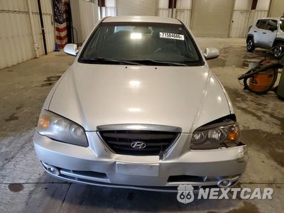 Piąte zdjęcie samochodu w środku: 2004 HYUNDAI ELANTRA GLS VIN:KMHDN46D24U850159 - miniatura
