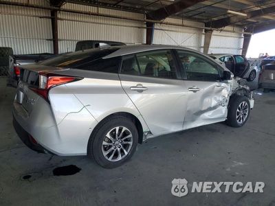 Trzecie zdjęcie samochodu z tyłu: 2021 TOYOTA PRIUS XLE VIN:JTDKAMFU1M3134849 - miniatura