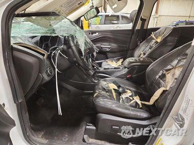 Zdjęcie 7 z 13 samochodu: 2014 FORD ESCAPE TITANIUM VIN:1FMCU9J96EUB90773 - miniatura