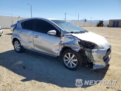 Czwarte zdjęcie samochodu z boku: 2017 TOYOTA PRIUS C TWO VIN:JTDKDTB34H1596189 - miniatura