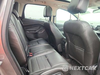 Zdjęcie 11 z 13 samochodu: 2014 FORD ESCAPE TITANIUM VIN:1FMCU9J98EUB56558 - miniatura