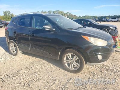 Czwarte zdjęcie samochodu z boku: 2013 HYUNDAI TUCSON GLS VIN:KM8JU3AC8DU578781 - miniatura