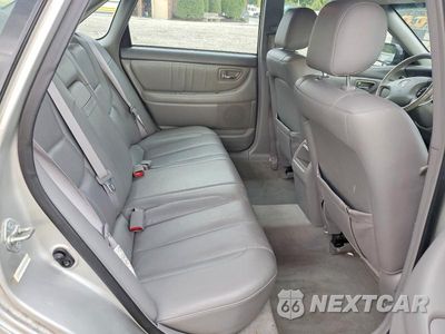 Zdjęcie 10 z 12 samochodu: 2002 TOYOTA AVALON XL VIN:4T1BF28B52U212621 - miniatura