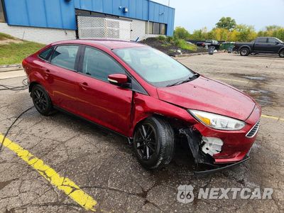 Czwarte zdjęcie samochodu z boku: 2016 FORD FOCUS SE VIN:1FADP3F21GL251891 - miniatura