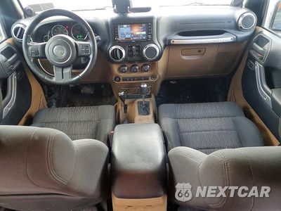 Zdjęcie 8 z 14 samochodu: 2011 JEEP WRANGLER UNLIMITED SAHARA VIN:1J4BA5H16BL526581 - miniatura