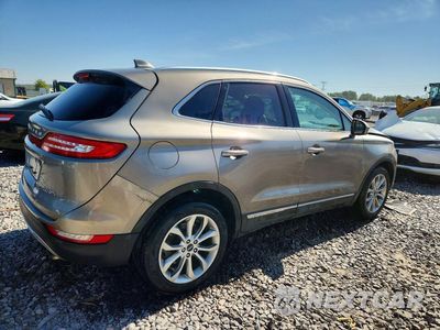Trzecie zdjęcie samochodu z tyłu: 2016 LINCOLN MKC SELECT VIN:5LMCJ2D96GUJ30570 - miniatura