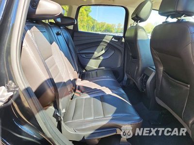 Zdjęcie 11 z 13 samochodu: 2017 FORD ESCAPE TITANIUM VIN:1FMCU9J98HUA07135 - miniatura
