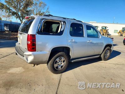 Trzecie zdjęcie samochodu z tyłu: 2012 CHEVROLET TAHOE K1500 LS VIN:1GNSKAE00CR233479 - miniatura