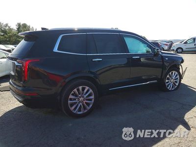 Trzecie zdjęcie samochodu z tyłu: 2021 CADILLAC XT6 PREMIUM LUXURY VIN:1GYKPDRS4MZ115650 - miniatura