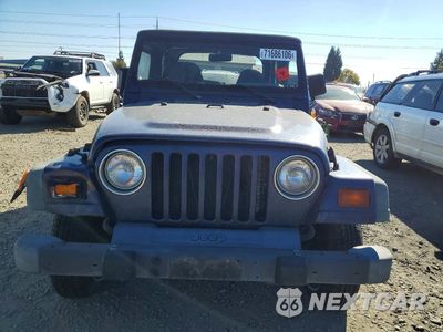 Piąte zdjęcie samochodu w środku: 1999 JEEP WRANGLER VIN:1J4FY29P7XP447158 - miniatura