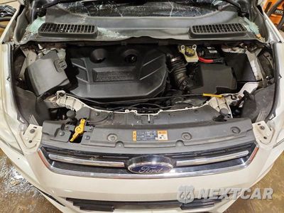 Zdjęcie 11 z 13 samochodu: 2014 FORD ESCAPE TITANIUM VIN:1FMCU9J96EUB90773 - miniatura
