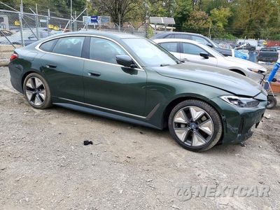Czwarte zdjęcie samochodu z boku: 2023 BMW I4 EDRIVE 35 VIN:WBY43AW01PFR47172 - miniatura