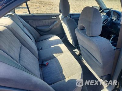 Zdjęcie 10 z 12 samochodu: 2003 HONDA CIVIC LX VIN:2HGES16593H600946 - miniatura