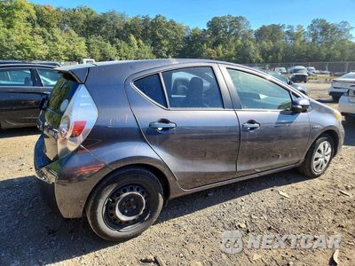 Trzecie zdjęcie samochodu z tyłu: 2014 TOYOTA PRIUS C ONE VIN:JTDKDTB39E1066053 - miniatura