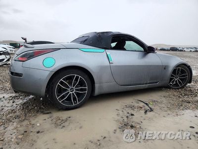 Trzecie zdjęcie samochodu z tyłu: 2004 NISSAN 350Z ENTHUSIAST VIN:JN1AZ36A04T000650 - miniatura
