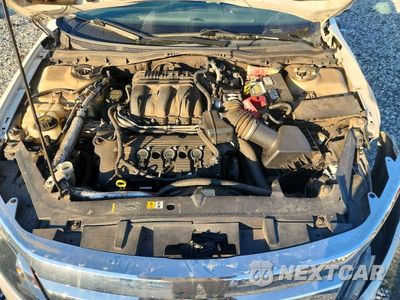 Zdjęcie 11 z 12 samochodu: 2010 FORD FUSION SEL VIN:3FAHP0JG0AR228498 - miniatura