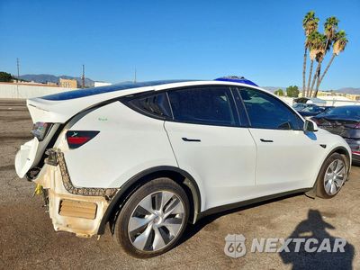 Trzecie zdjęcie samochodu z tyłu: 2023 TESLA MODEL Y VIN:7SAYGDEE0PA137770 - miniatura
