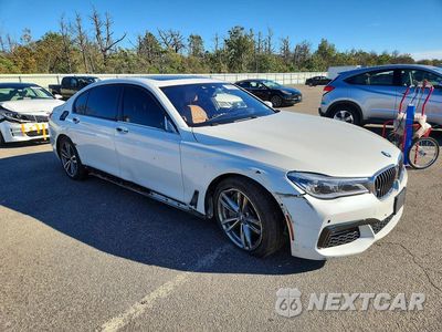 Czwarte zdjęcie samochodu z boku: 2017 BMW 750 XI VIN:WBA7F2C53HG422649 - miniatura