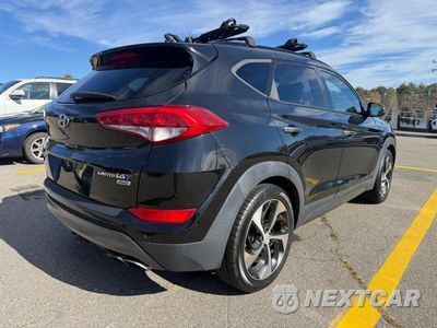Czwarte zdjęcie samochodu z boku: 2016 HYUNDAI TUCSON LIMITED VIN:KM8J3CA28GU056814 - miniatura