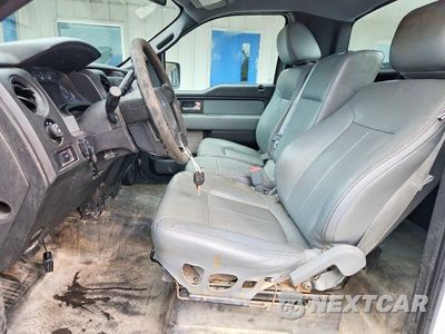 Zdjęcie 7 z 12 samochodu: 2014 FORD F150 VIN:1FTMF1CM4EKF55601 - miniatura
