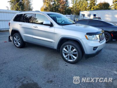 Czwarte zdjęcie samochodu z boku: 2013 JEEP GRAND CHEROKEE LAREDO VIN:1C4RJFAG5DC537518 - miniatura