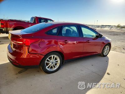 Trzecie zdjęcie samochodu z tyłu: 2016 FORD FOCUS SE VIN:1FADP3F29GL293709 - miniatura